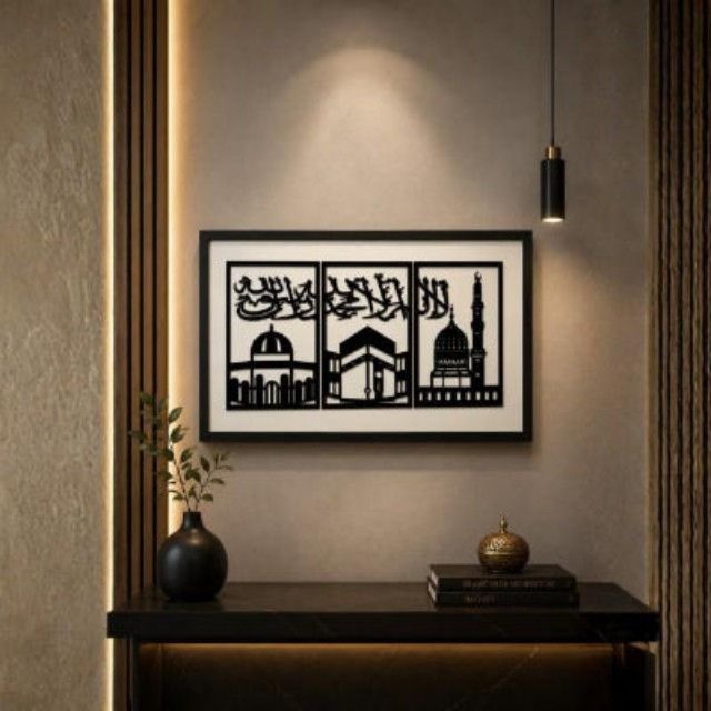 Framed artwork on a wall with a console table below